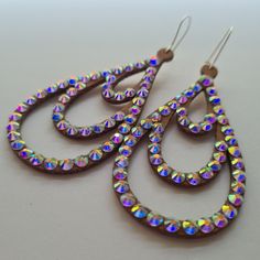 New collection of earrings! High quality of material, very shiny glass crystals, hold tight to your ears while dancing! Earrings catalog https://etsy.me/3IE3rZJ Necklace catalog https://etsy.me/3YM2jZO My profile on Linktree https://bit.ly/3JRVHEF Iridescent Jeweled Jewelry For Parties, Jeweled Dangle Teardrop Earrings For Party, Party Jeweled Dangle Teardrop Earrings, Party Jeweled Teardrop Dangle Earrings, Sparkling Drop Chandelier Earrings For Party, Party Crystal Teardrop Earrings With Sparkling Stones, Drop Crystal Earrings For Party, Handmade Iridescent Crystal Earrings For Party, Teardrop Crystal Clip-on Earrings For Party