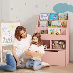 Descriptions: Keep your child’s room organized and tidy with this versatile kid’s bookcase featuring three tiers, two storage compartments, and a large drawer perfect for books, toys, and more. Classroom Bookshelf, Organizing Kids Books, Become Organized, Bookshelf For Kids, Bookcase With Storage, Drawers On Wheels, Storage Bookshelf, Childrens Bookcase, Kids Bookshelf