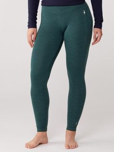 Update your cold-weather kit with tights that adapt to your activity. Smartwool Classic Thermal Merino base layer bottoms offer cozy warmth for stop-and-go activities and feature an improved fit. Fitted Green Winter Activewear, Fitted Green Activewear For Winter, Winter Compression Casual Tights, Comfortable Fitted Winter Activewear, Casual Winter Compression Tights, Casual Compression Tights For Winter, Comfortable Fitted Activewear For Winter, Functional Winter Yoga Bottoms, Winter Sports Compression Tights