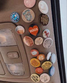 the interior of a car with many different buttons attached to it's side panel