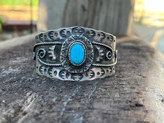 This Kingman turquoise cuff is hand stamped and detailed.  2.25 x 1.75 inch cuff opening. Super comfy and lightweight. Fits small to medium wrists. Turquoise Stamped Cuff Bangle Bracelet, Turquoise Stamped Cuff Bracelet Bangle, Western Style Stamped Turquoise Cuff Bracelet, Western Turquoise Stamped Cuff Bracelet, Turquoise Stamped Western Cuff Bracelet, Turquoise Western Stamped Cuff Bracelet, Stamped Turquoise Cuff Bracelet Gift, Artisan Blue Engraved Cuff Bracelet, Turquoise Stamped Cuff Bracelet As Gift