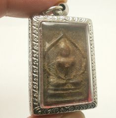 Somdej LP Boon Buddha Meditate in Magic Nirvana back Magic Yantra Size : 2.8 x 4.6 cm. (Approx.) Luang Poo Boon was born in 1848 in Nakorn Pathom Province. He went into priesthood of Wat Klang Bang Kaew Temple when he was 15 years old( 1863). He passed away in the year 1937 at the age of 89 years old. LP Boon is one of Thailand most famous Monk in making Amulet, Charm and Talisman. **Best for this Economic Recovery . The Power of Buddha will help you get through all obstacles and get back on tra Rectangular Spiritual Good Luck Jewelry, Rectangular Spiritual Jewelry For Good Luck, Spiritual Rectangular Jewelry For Good Luck, Spiritual Rectangular Good Luck Jewelry, Rectangular Spiritual Jewelry For Rituals, Spiritual Rectangular Jewelry For Rituals, Silver Rectangular Jewelry For Blessing, Rich Gift, Rich Gifts