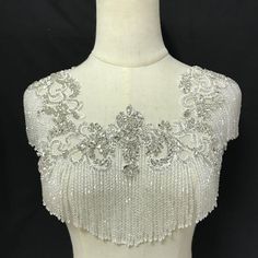 Bodice V Neck Rhinestone Applique Heavy Beads Motif Diamante Lace Patch sewing on Bridal Wedding Ball Dress Gown 1 PC (SAP1470)Size:  33 cm x 30 cm (12.9" x 11.81")This listing is for 1 piece, more in stock.We offer special discounts for designers and wholesale orders!You can choose a express shipping here:https://www.etsy.com/listing/602095820/express-shipping-charge?ref=shop_home_active_8Please send us your phone number if you choose express delivery.Any problem, please feel free to contact us White Crystal Embellished Bridal Necklace, White Crystal Embellished Bridal Necklace For Wedding, White Rhinestone Bridal Accessories For Ceremony, White Bridal Accessories With Rhinestones For Ceremony, White Embellished Bridal Accessories For Mother Of The Bride, Embellished White Bridal Accessories For Mother Of The Bride, Fitted White Crystal Bridal Accessories, White Embellished Wedding Dress For Reception, Silver Embellished Wedding Dress