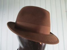 Vintage french trilby in chocolate brown with brown hat band. The inside band is leather.  Good condition. Dimensions: Circumference: 22 1/2 Inches. Height: 4 Inches. Brim to brim: 11 Inches. Made by FLETCHET Brown Hat, Mens Hat, Brown Hats, Vintage Hat, Hat Band, Lovely Dresses, Hats Vintage, Vintage French, Cut And Style