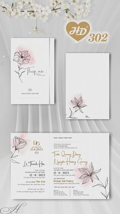 wedding stationery with flowers and hearts on the front, in pink and white colors