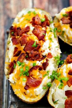 baked potatoes with bacon and cheese on a baking sheet