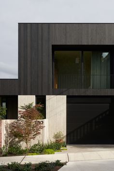 The exterior of this minimalist, modern, waterfront home is wrapped in our Shou sugi ban wood, and was designed as a plinth with thick walls and hearth rising out of it, capped by a carved wooden volume. Bungalow Extensions, Clad Home, Wooden Facade, Exterior Inspiration, Facade Cladding, Sugi Ban, Shou Sugi Ban, House Modern, Modern Beach House