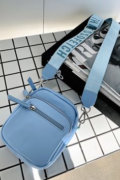 A basic must have! The Rubab cross body offers 3 pockets, silver hardware and an adjustable webbed shoulder strap with the "THATSSOFETCH" logo printed through out. Wear her on repeat with your day to day fits! Day Fits, Day To Day, To Day, On Repeat, Cross Body Bag, Blue Bags, Silver Hardware, Body Bag, Sale Items