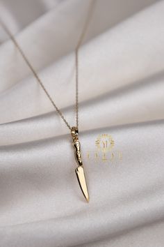 "ABOUT PRODUCT This 14K Gold Knife Necklace is beautifully designed and hand crafted with our associates to make this a special gift for your loved ones. Knowing the value of our customers, We prepare each piece with extra care and attention. ITEM DETAILS Material: 14K Gold Approx: 2,70 gram   Only Pendat: 1,80 gram Available colors: Gold, Rose Gold, White Gold Available Sizes: 14\" to 20\" ✪ 14k Solid Gold ( Certification will be included with your order ) ✪Available 14K White, Yellow, Rose Gol Minimalist 16-inch Jewelry As A Gift, 14k Gold Jewelry As Gift, 16 Inch Length, Artisan Yellow Gold Jewelry Gift, Handmade Fine Jewelry Necklaces For Gifts, Handmade Fine Jewelry Necklaces As Gift For Her, Handmade Fine Jewelry Necklace Gift, Unique Handmade 14k Gold Necklaces, Handmade 14k Gold Pendant Necklace, Handmade Delicate 14k Gold Necklaces