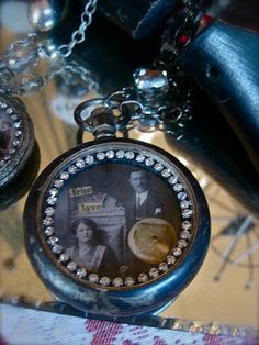 an antique pocket watch is sitting on a table