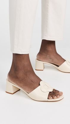 Larroude Flora Mules | Shopbop Cream Leather Square-toe Heels, Cream Leather Square Toe Heels, Cream Leather Heels With Square Toe, Cream Square Toe Leather Heels, Classic Mules With Sculpted Heel And Round Toe, Formal Beige Mules With Buckle Closure, Beige Leather Mules, Beige Leather Mules With Leather Footbed, Beige Open Heel Mules With Buckle Closure