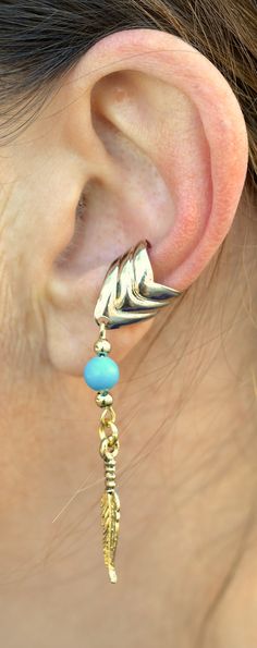 Style Tips: Wear an Ear Cuff with Charm on each ear to get a unique balanced set. Details: Weight: 2.4 grams Metal: Gold overlay on Brass Base Diameter: 0.5" Width: 0.5" Length: 2.0" Color: Gold Biker Jewelry, One Size Fits All, Ear Cuff, Cuff, Turquoise, Gold, How To Wear