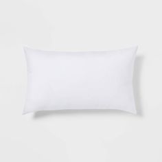 a white pillow on a white background