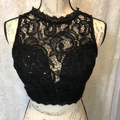 Instantly Become The Center Of Attention And Leave Everyone Speechless When You Enter The Room In This Lacy Black Crop Top With Sequence. New With Tags. Size Xs. Black Crop Top With Built-in Bra For Evening, Sleeveless Lace Crop Top For Party, Black Crop Top With Built-in Bra For Night Out, Black Backless Party Top, Lace Crop Top With Built-in Bra For Night Out, Backless Lace Top For Night Out, Black Backless Crop Top For Party, Stretch Lace Crop Top For Night Out, Backless Lace Party Tops