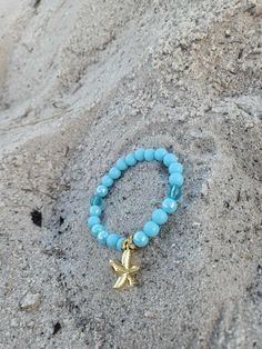 Trendy starfish bracelet brings you at peace with the ocean. Gives you a sense of belonging. 7.5 inches and stone beads used. Adjustable Starfish Charm Jewelry, Turquoise Beaded Bracelets With Starfish Charm, Turquoise Starfish Beaded Bracelets, Ocean-inspired, Ocean-inspired Turquoise Starfish Beaded Bracelets, Ocean-inspired Turquoise Bracelet With Starfish Charm, Turquoise Ocean-inspired Bracelet With Starfish Charm, Turquoise Bracelet With Starfish Charm As Gift, Starfish Charm Bracelet As A Gift, 8mm Bead Bracelet For Beach