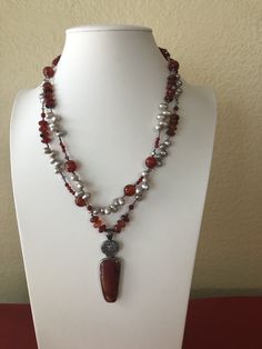 "Beautiful Starborn sterling silver 925 faceted stone necklace with long white rough quartz druzy and peach agate pendant. Necklace is double stranded with white fresh water pearls and carnelian beads. Its a Beautiful piece to compliment any look you want to carry . Necklace is 19\" long and multicolor, it offers about 2.5\" of plain chain in the back for adjustability to suit your mood and it is stamped 925 STARBORN in the back of the pendant. In good used/vintage conditions and in its original Bohemian Silver Pearl Necklace With Natural Stones, Silver Carnelian Beaded Necklace With Gemstone Beads, Silver Beaded Carnelian Necklace, Silver Beaded Carnelian Necklaces, Silver Carnelian Beaded Necklace, Silver Double Strand Beaded Necklaces With Natural Stones, Silver Agate Crystal Necklace With Gemstone Beads, Silver Necklaces With Carnelian And Natural Stones, Silver Carnelian Necklaces With Natural Stones