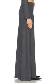 47% polyester 47% rayon 6% spandex.  Made in USA.  Hand wash.  Unlined.  Pull-on styling.  Item not sold as a set.  .  .  .  .  .  .  .  .  .  . Stretch Elastane Skirt, Spring Elastane Maxi Skirt, Fitted Maxi Skirt For Fall Workwear, Versatile Long Skirt For Fall, Elegant Fall Skirt With Elastic Waistband, Stretch Rayon Maxi Skirt, Chic Stretch Maxi Skirt For Fall, Long Stretch Lined Skirt, Stretch Flared Pencil Skirt