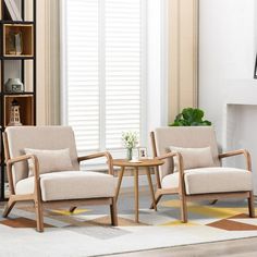 a living room with two chairs and a coffee table