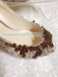 Gorgeous and comfortable Unique  beaded Lace shoes heel is 2 1/4'' inches VERY ELEGANT AND CLASSIC HEEL: 2.5" US SIZE: 7.5 READY TO SHIP, INSIDE LENGTH 9 3/4" INCHES, PLEASE MEASURE YIUR FEET LENGHT, YOU MAY CONTACT FOR HELP. FINAL SALE. FOR OTHER SIZES PLEASE VISIT THE LINK BELOW: https://www.etsy.com/listing/561048873/bridal-shoes-taupe-beaded-lace-2-14? Chocolate hand beaded appliqué with a touch of cooper beading, please look at the pictures.  PLEASE KNOW THAT  ELABORATION OF ORDER IS 5 BUSINESS DAYS PLUS SHIPPING TIME, PLEASE CONTACT FOR ANY QUESTIONS. Colors:   Taupe Shoes/Chocolate beaded appliqués, as pictured.  IVORY Shoes/Chocolate beaded appliqué as shown  If, you have questions with color match, please contact, shoes can not be returned, or exchanged, please read below. Ivory l Taupe Wedding, Taupe Shoes, Ivory Shoes, Lace Pumps, Wedding Pumps, Lace Shoes, Mid Heel Shoes, Shoes Heel, Beaded Wedding