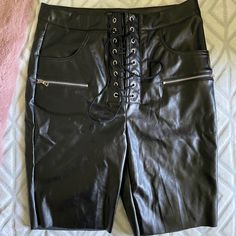 Never Worn Fashion Nova Black Leather Lace Up Shorts Size Large. Black Faux Leather Club Bottoms, Black Short Length Leather Pants For Night Out, Faux Leather Bottoms For Going Out, Short Length, Faux Leather High-waisted Shorts For Going Out, Edgy Short Bottoms For Going Out, Lace Up Shorts, Lace Up Leggings, Honey Punch, Legging Pants