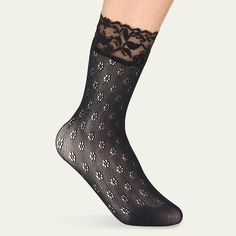 Stems socks in daisy lace with scalloped lace cuffs Ankle length Nylon/polyamide Machine wash cold Imported Black Socks With Lace Trim For Spring, Fitted Black Socks With Lace Trim, Black Lace Socks With Lace Trim, Elegant Mid-calf Socks For Spring, Lace Ankle Socks, Lace Cuffs, Scalloped Lace, Ankle Socks, Ankle Length