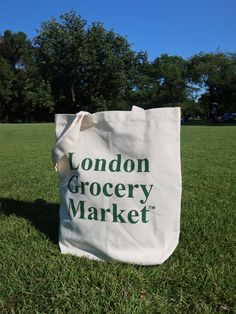 Editor's notesLONDON GROCERY MARKET's comfy and casual tote bag with logo printing on it.- Casual tote bag- Enough storage- Logo printing on the front- Versatile itemMeasurements(in.)One size- Width: 14.17 in.- Height: 16.14 in.- Depth: 3.93 in.- Strap: 24.40 in.Composition & Care- 100% Cotton- When washing, please hand wash only the contaminated partDesigner- by LONDON GROCERY MARKET Eco-friendly Green Bag With Letter Print, Eco-friendly Tote Bags For Grocery Shopping, Eco-friendly Rectangular Shoulder Bag For Grocery, Eco-friendly Tote Bags For Grocery, Eco-friendly Green Bags With Letter Print, Eco-friendly Canvas Bag With Letter Print, White Canvas Grocery Bags, Canvas Tote Bag For Groceries, Casual Large Capacity Bag For Market