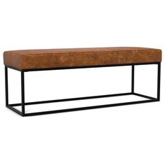 a brown leather bench sitting on top of a metal frame shelf with a black base