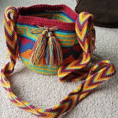 Small New Wayuu Bag. Authentic Wayuu Bag From Colombia, South America. Handmade From Cotton, Strong Material. All Bags Are Different Colors And Patterns, No Bag Is Made The Same So Consider This A Unique And Original Bag! Colors Are Bright And Will Definitely Catch Everyone's Eye! Beautiful For Everyday Use Or Festivals. Very Boho And Chic. So Beautiful!!! Handmade Red Bucket Bag For Everyday Use, Casual Multicolor Bucket Shoulder Bag, Colorful Bucket Bag For Daily Use, Casual Multicolor Handheld Satchel, Multicolor Rectangular Bucket Bag With Detachable Strap, Rectangular Multicolor Bucket Bag With Detachable Strap, Multicolor Bucket Shoulder Bag With Adjustable Strap, Colorful Crossbody Travel Bag, Multicolor Crochet Bag With Adjustable Strap For Shopping