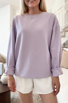 Our effortless Emily Vintage Wash Sweater Top is a must-have closet staple! Featuring an oversized fit, perfect lavender color, ribbed knit fabric, crew neckline, mineral washed color and long sleeves. This cozy top can be worn with anything from lounge sweats to high waisted jeans! Details & Sizing Oversized fit Lavender color Ribbed knit fabric Mineral washed Long sleeves Gabriella is wearing a size S Fabric 100% Cotton Shipping & Returns We offer free ground shipping on USA domestic orders ov Lavender Sweater Outfit, Soft-washed Oversized Everyday Tops, Oversized Soft-washed Sweatshirt For Everyday, Oversized Soft-washed Winter Sweater, Comfortable Oversized Soft-washed Sweater, Oversized Soft-washed Cotton Sweater, Lavender Sweater, Jeans Details, Cozy Tops