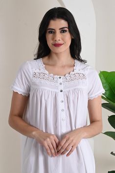 The perfect blend of comfort and charm with our cotton poplin nightgown, featuring short sleeves and a beautifully crafted lace trim neckline. Made from crisp, breathable cotton poplin, this nightgown offers a soft touch against the skin, ensuring a comfortable fit for warm nights. The short sleeves provide a relaxed yet polished look, while the elegant lace trim at the neckline adds a delicate, feminine touch. Falling gracefully to mid-calf, this nightgown showcases a flattering silhouette that effortlessly combines style and ease. Model (Daniele Sanfer) is 5'9"/ 179cm and wearing XS size dress with length 120 cm. Available Size : XS : Bust Upto 36 Inches S : Bust Upto 38 Inches M : Bust Upto 40 Inches L : Bust Upto 42 Inches XL : Bust Upto 44 Inches 2XL : Bust Upto 46 Inches 3XL : Bust U White Cotton Short Sleeve Nightgown, Summer Feminine Short Sleeve Nightgown, Feminine White Nightgown With Short Sleeves, Summer Nightgown With Lace Trim And Short Sleeves, Short Sleeve Lace Trim Sleepwear For Home, Feminine Short Sleeve Sleepwear With Lace Trim, Feminine Lace Trim Short Sleeve Sleepwear, White Short Sleeve Nightgown, Spring Sleepwear With Lace Trim And Short Sleeves