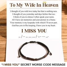 a card with the message to my wife in heaven on it and a bracelet that reads, i miss you