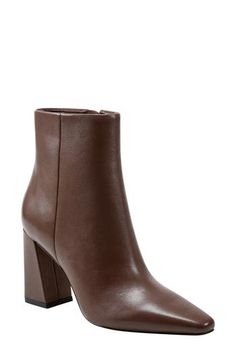 Boasting a clean-lined, sleek silhouette with a modern square toe and tapered block heel, this versatile leather bootie is a go-to cool-weather look. 3 1/2" heel(size 8.5) 4 3/4" shaft Leather upper/synthetic lining and sole Imported Causual Outfits, Modern Square, Marc Fisher, Leather Booties, Boot Shoes Women, Bootie, Block Heels, Dark Brown, Leather Upper