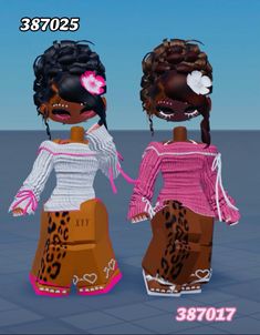 two dolls are standing next to each other in the same photo, one is wearing an animal print top and the other has leopard print pants