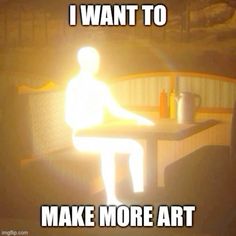 a person sitting at a table with the words i want to make more art