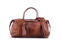 "Our medium size weekend bag in genuine leather for men and women. It is handmade in tanned brown leather. Large enough for extended weekend trips but enough for carry on in flight cabin. Great for anniversary gift for your partner.  FEATURES: # all zipper and hardware made out of dark brass # Adjustable strap - Detachable - with thick padding for comfort. # vegetable tanned leather light brown # handles, trimming and reinforcement in genuine leather.  # Lining in strong canvas, this bag in in c Classic Brown Weekender Bag For Trips, Brown Large Capacity Weekender Bag For Weekend Trips, Leather Weekender Bag In Cognac For Overnight Trips, Leather Cognac Weekender Bag For Overnight Trips, Brown Soft Leather Travel Bag For Trips, Brown Soft Leather Travel Bag, Brown Leather Travel Bag For Weekend Trips, Classic Brown Weekender Bag For Weekend Trips, Brown Satchel Weekender Bag For Weekend Trips