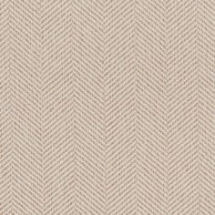 an upholstered beige fabric with herrings