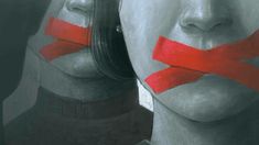 two women with red tape on their mouths