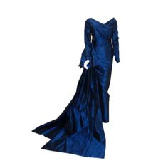 Description: Christian Dior vintage 1988 long blue gown This is a long royal blue silk taffeta gown by Christian Dior Haute Couture, from 1988-89. Long sleeves Wrapped front and back bodice Large bow on the side hip Two long trains Bust: 32 in. Waist: 27 in. Hips: 34 in. Length: 61 in. Provenance: Betsy Bloomingdale Details: Size: 27 Color: Blue Material: Silk TaffetaCondition: GoodBrand: Christian Dior Shipping: STANDARD: $9.95 EXPEDITED: $19.95 Betsy Bloomingdale, Taffeta Gown, Christian Dior Haute Couture, Dior Vintage, Dior Haute Couture, Blue Gown, Silk Taffeta, Long Train, Large Bow