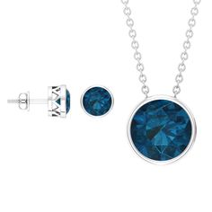 Product Details This Solitaire Jewelry Set is an exquisite gift for your wife, girlfriend, or mother. Comprising of a stunning Necklace and small Stud Earrings, both adorned with Round Shape London Blue Topaz Gemstones elegantly set in bezel settings. Crafted from Solid Gold Metal, this Bridal Jewelry Set exudes timeless beauty and sophistication. Product Information SKU SHP-PENDANT122046417 Length 9.5 mm Width 9.5 mm Weight 3.76 gm (Approximate) LONDON BLUE TOPAZ INFORMATION No.of Stones 3 Piec Small Stud Earrings, Bridal Jewelry Set, Topaz Necklace, Small Earrings Studs, Signature Jewelry, Timeless Jewelry, Stunning Necklace, Bridal Jewelry Sets, London Blue Topaz