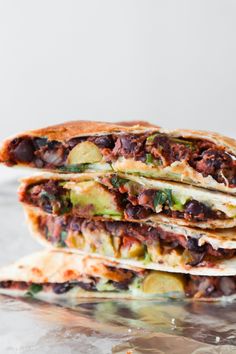 three quesadillas stacked on top of each other