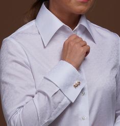 Exquisite White 100% Cotton Shirt with Floral Texture for Women In my shop, quality is our top priority. If you appreciate premium craftsmanship and timeless elegance, you will love this shirt. This stunning white cotton shirt is crafted from luxurious structured floral fabric, offering a unique texture and visual appeal. With its french cuffs designed for cufflinks (not included), this shirt is perfect for adding a personal, sophisticated touch to your outfit. The shirt features a high collar w Classic Formal Dress Shirt With Cuffed Sleeves, Classic Formal Blouse With Open Cuff, Elegant Formal Dress Shirt With Cuffed Sleeves, Luxury Long Sleeve Dress Shirt For Wedding, Elegant Open Cuff Office Tops, Formal Tops With Button Cuffs, Classic Formal Blouse With Cuff, White Office Shirt With Cuffed Sleeves, White Cuff Dress Shirt For Office