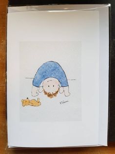 a drawing of a person with a hat and beard laying on the ground next to a dog