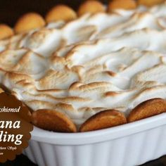 a banana pudding in a white dish on a table