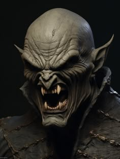 a close up of a demon with its mouth open