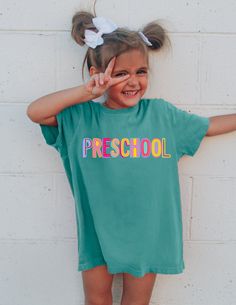 Welcome to our Shop! We are so happy you decided to check out our items! All items we sell are inspired by my girls, and are designs we love and wear ourselves >We use custom DTF transfers >We use unisex heavy cotton t shirts >Preshrunk >We use Comfort Color T Shirts Care >Wash inside out, gentle cycle, cold water, tumble dry on low >Do not iron over design directly  Returns >Items are made to order, so we do not accept returns unless something is wrong with the item itself Fun Pink T-shirt For School Events, Playful T-shirt For Back To School, Cute Multicolor T-shirt For Back To School, Playful Green Top For School, Playful Green Tops For School, Cute Multicolor T-shirt With Name Print, Fun T-shirt For Back To School, Fun School Tops With Name Print, Fun Green T-shirt For School