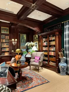 a living room filled with furniture and bookshelves