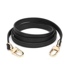 a black leather leash with gold buckles