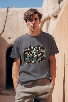 Artistic Mountain Graphic Unisex T-Shirt - 100% Ring-Spun Cotton, Lightweight, Classic Fit, Ethically Produced Material 🧵: This unisex t-shirt is made from light-weight fabric at 4.5 oz/yd² (153 g/m composed of high-grade 100% ring-spun US cotton for enduring comfort. Heather colors and sports grey include polyester. Durability 🛡️: The pre-shrunk fabric ensures consistent fitting. The shoulders have twill tape for improved durability. The collar is made with ribbed knitting to prevent curling damage. Ethical Production 🌐: Proudly made with US cotton that is responsibly grown and harvested, aligning with the ethical standards of the US Cotton Trust Protocol. This tee is certified by Oeko-Tex for safety and quality assurance. Fit 👕: A classic fit for ultimate comfort in casual to semi-fo Casual Crew Neck Sublimation Design With Custom Artwork, Artsy Crew Neck T-shirt With Graphic Design, Graphic Tee With Custom Artwork And Relaxed Fit, Artsy Crew Neck Shirt With Relaxed Fit, Relaxed Fit Graphic Tee With Custom Artwork, Relaxed Fit Crew Neck T-shirt With Custom Artwork, Artsy Short Sleeve T-shirt With Custom Print, Gray Graphic Tee With Custom Print, Tri-blend T-shirt With Custom Artwork