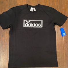 Brand New Adidas T-Shirt Black Size Xl Preowned Adidas T-Shirt Grey Size L Basic Adidas T-shirt With Graphic Print, Basic Adidas T-shirt For Streetwear, Adidas Black Shirt For Streetwear, Black Adidas Shirt For Streetwear, Adidas Black Crew Neck Shirt, Adidas Tshirt, Adidas T Shirt, Adidas Shirt, Adidas Black