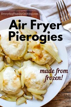 an air fryer pierogies made from frozen potatoes on a white plate with a fork